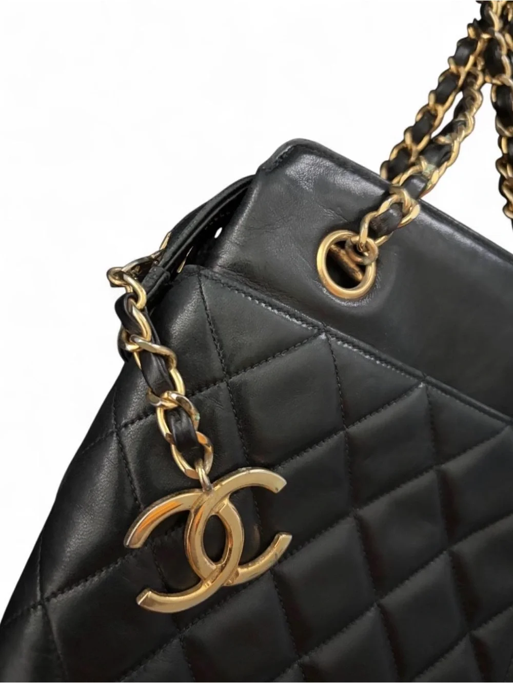 CHANEL Black Quilted Lambskin Leather Purse with Gold Hardware